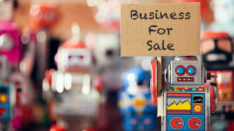 Robot holding a Business for sale sign